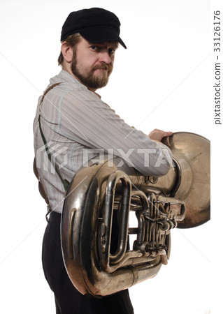 man with cap holding the tube. standing back 33126176