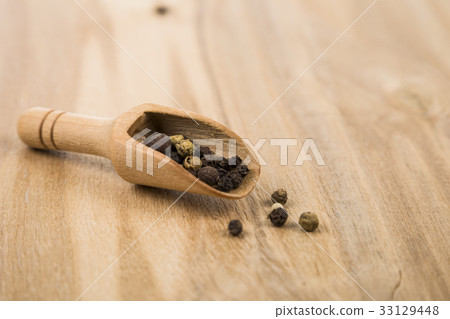 Chilli peppers on a wooden board 33129448
