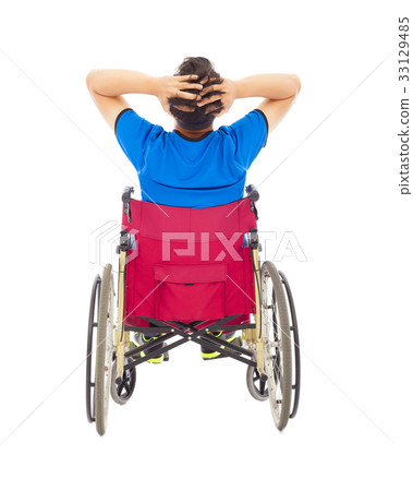 handicapped man sitting on a wheelchair  33129485