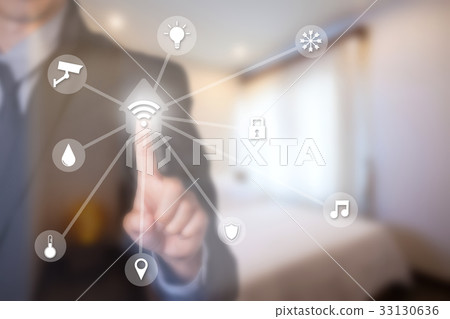 Businessman using smart home Intelligent assistant Businessman using smart home Intelligent assistant 33130636