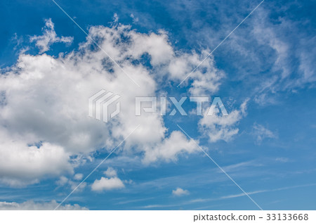 puffy cloud motion on a blue summer sky 33133668