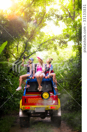 Trip of asian lady with 4WD car drive off road 33133831