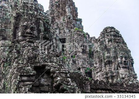 Bayon with smiling stone faces in Cambodia 33134345