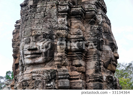 Bayon with smiling stone faces in Cambodia 33134364
