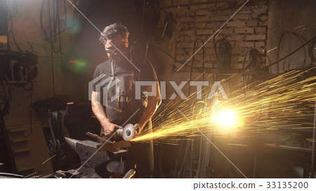 Sparks during cutting of metal angle grinder 33135200