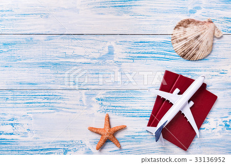 Travel objects on blue wooden background Travel objects on blue wooden background 33136952