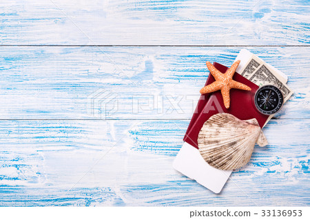 Travel objects on blue wooden background Travel objects on blue wooden background 33136953