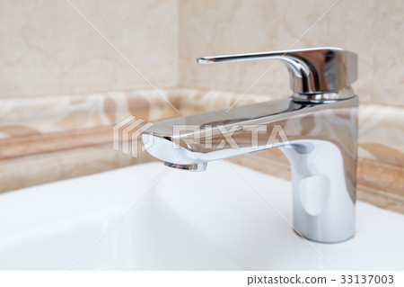 Faucet in bathroom Faucet in bathroom 33137003