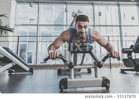 Happy man going in for sports 33137970