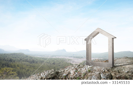 Conceptual image of concrete home sign on hill and natural landscape at background Conceptual image of concrete home sign on hill and natural landscape at background 33145533