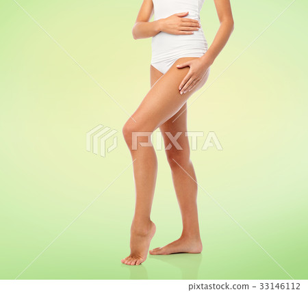 legs of beautiful young woman in white underwear legs of beautiful young woman in white underwear 33146112