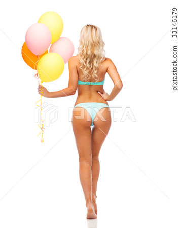 woman in bikini swimsuit with air balloons 33146179