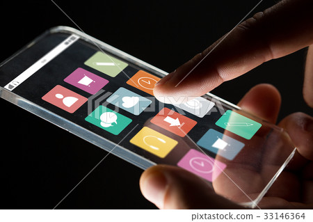 close up of businessman hand with glass smartphone 33146364