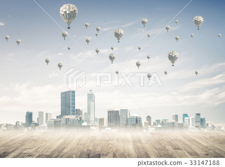 Concept of air pollution concept with aerostats flying above cit Concept of air pollution concept with aerostats flying above cit 33147188