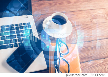 Business workplace with laptop coffee cup and security concept o Business workplace with laptop coffee cup and security concept o 33147283