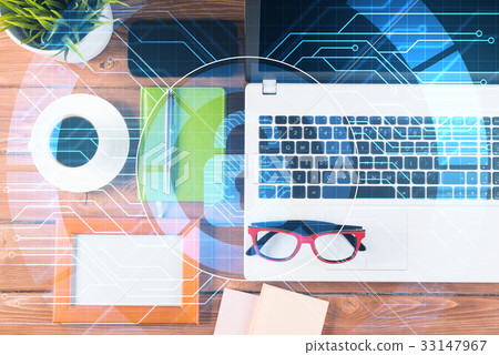 Business workplace with laptop coffee cup and security concept on screen 33147967
