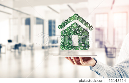 Real estate or construction idea presented by home icon on table Real estate or construction idea presented by home icon on table 33148234