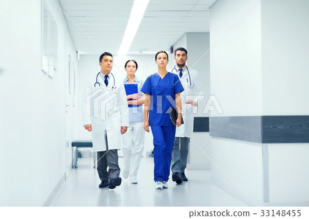 group of medics or doctors at hospital corridor 33148455