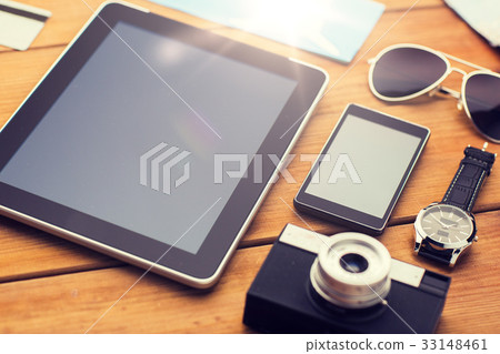 close up of smartphone and travel stuff 33148461