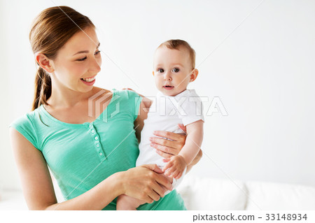 happy young mother with little baby at home happy young mother with little baby at home 33148934