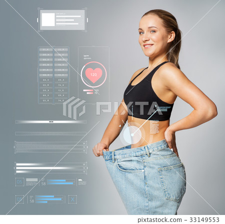 young slim sporty woman in large size pants 33149553