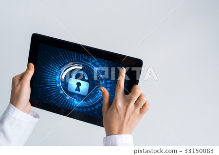 Close of female doctor hands working with tablet pc computer Close of female doctor hands working with tablet pc computer 33150083