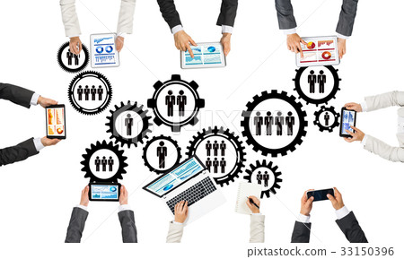 Top view of businesspeople sitting at table and using gadgets Top view of businesspeople sitting at table and using gadgets 33150396