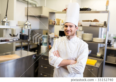 happy male chef cook at restaurant kitchen happy male chef cook at restaurant kitchen 33152740