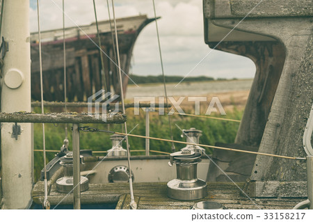 Old yacht on the beach 33158217