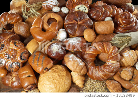 Assorted breads isolated on white Assorted breads isolated on white 33158499