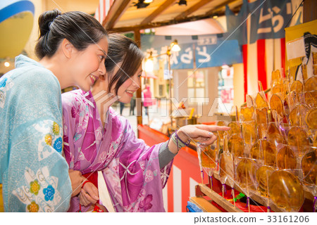 Woman dressing kimono choice lollipop Woman dressing kimono choice lollipop 33161206