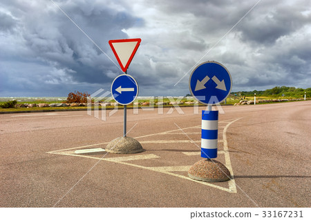 Road signs on the highway in a storm Road signs on the highway in a storm 33167231