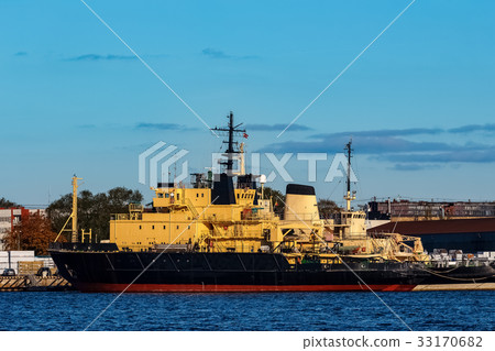 Yellow icebreakers moored 33170682