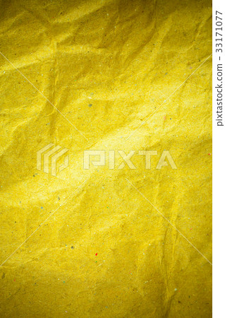 Yellow vignette crumpled paper. 33171077