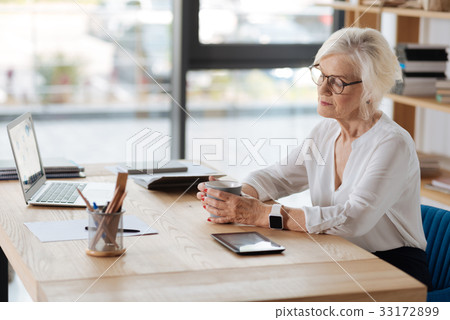 Nice pleasant woman drinking tea 33172899