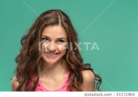 The young woman's portrait with happy emotions 33172969