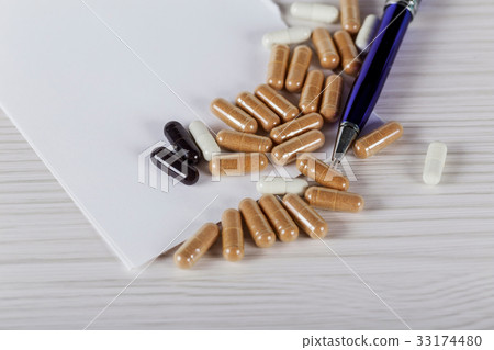 Close up vitamin pill wood table, healthy concept 33174480