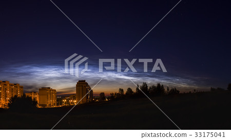 Panorama of noctilucent clouds in the night sky Panorama of noctilucent clouds in the night sky 33175041