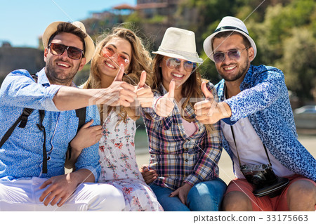 Group of friends taking funny portraits outdoor Group of friends taking funny portraits outdoor 33175663