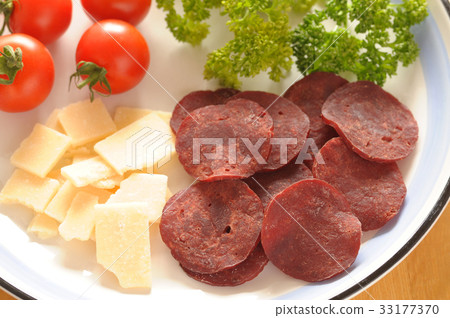 Salami with cheese and tomato Salami with cheese and tomato 33177370