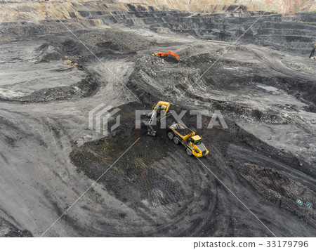Aerial view open pit mine, loading of rock, mining Aerial view open pit mine, loading of rock, mining 33179796