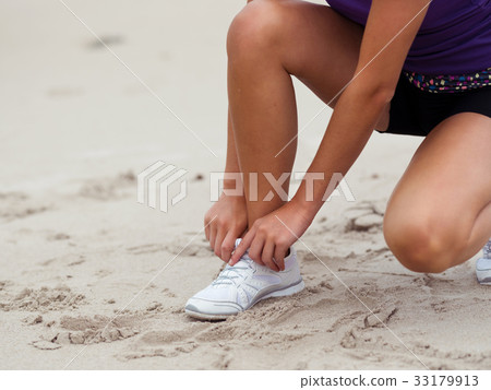 Lacing up before running Lacing up before running 33179913