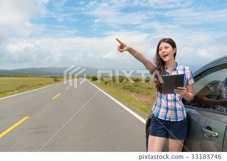 girl happily pointing famous pastoral scenery 33183746