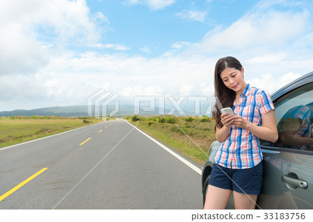 beautiful young female traveler stopping car beautiful young female traveler stopping car 33183756