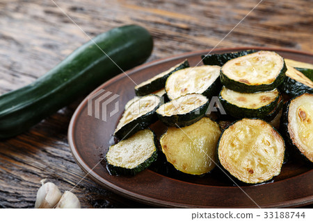 Fried and fresh zucchini Fried and fresh zucchini 33188744
