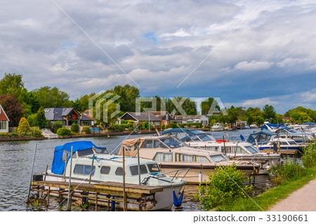 Boats anchored on the bank of the river 33190661