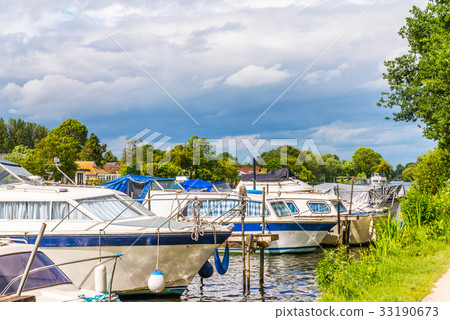 Boats anchored on the bank of the river 33190673
