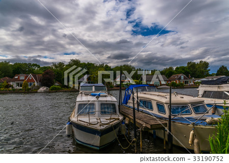 Boats anchored on the bank of the river 33190752