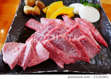 Meat on dish at BBQ grill buffet restaurant Meat on dish at BBQ grill buffet restaurant 33193901