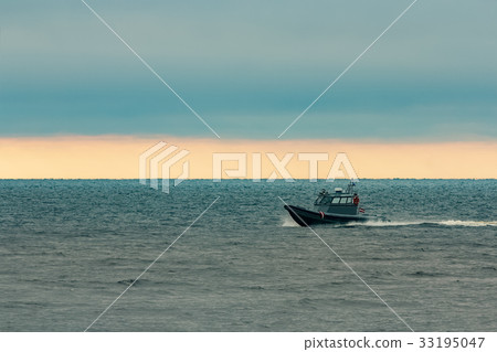 Small grey border guard boat Small grey border guard boat 33195047